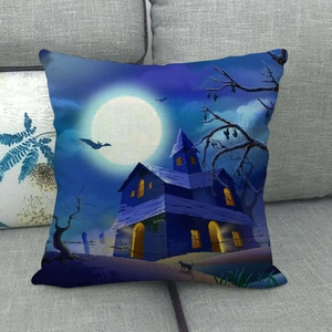 Blue starry Halloween linen pillow cover with castle and full moon on a sofa