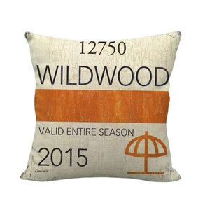 Linen texture cushion cover with Wildwood typography and orange sunshade icon on white background