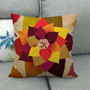 Close-up of autumn leaves mandala pattern on textured linen decorative pillowcase