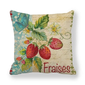 Close-up of vintage linen pillowcase with strawberry butterfly print and Fraises text