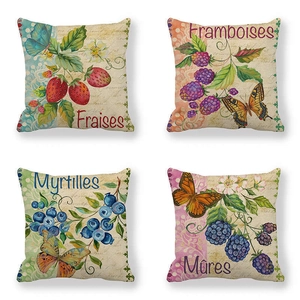 Set of four linen pillow covers featuring botanical fruit illustrations and butterflies