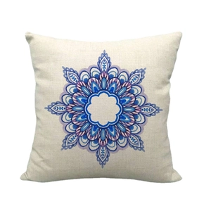 Linen square throw pillow cover featuring blue mandala geometric pattern on beige fabric