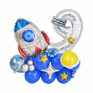 Detail of space theme birthday party balloon set with silver number 2 and rocket balloons