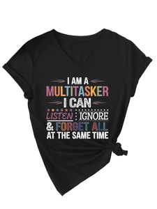Black V-neck tee with colorful pop art typography and stylish knot detail at the hem