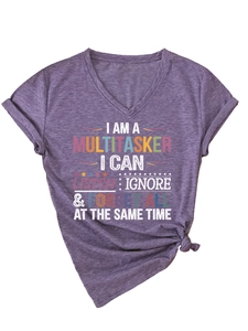 Detail of V-neck heather purple T-shirt with vintage slogan and creative knot hem design