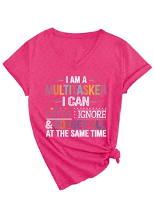 Detail of V-neck magenta tee with multitasker print and stylish side knot design