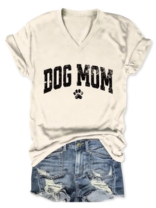 Detail of dog mom print and paw icon on cream V-neck short sleeve knit t-shirt