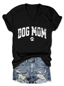 Close-up of V-neck T-shirt with Dog Mom print and distressed denim shorts