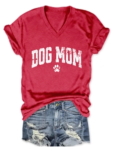 Close-up of red V-neck T-shirt featuring Dog Mom print with paw detail and cotton texture