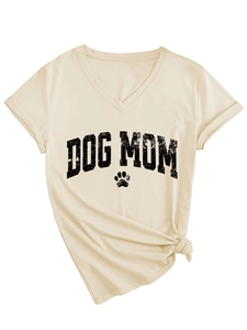 Close-up of beige V-neck Dog Mom t-shirt with paw print design and front knot detail