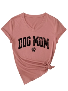 Detail of V-neck dusty rose T-shirt featuring distressed Dog Mom print and knotted hem