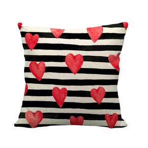 Linen square pillowcase with black horizontal stripes and a red watercolor heart pattern
