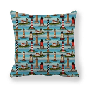 Detailed close-up of square linen pillowcase with blue lighthouse and ocean patterns