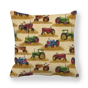 Detail of vintage tractor pattern print on beige linen pillowcase with fabric texture