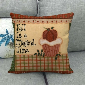 Detail of linen pumpkin cupcake pillow cover with fall is a magical time text