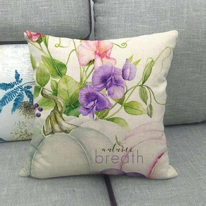 Close-up of linen pillowcase with watercolor pumpkin and autumn breath floral print