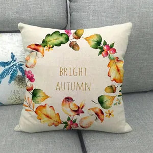 Close-up of linen cushion cover with Bright Autumn leaves and mushroom print