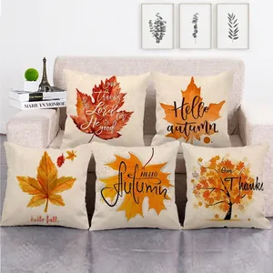 Set of five autumn linen pillow covers with colorful maple leaves and festive greetings