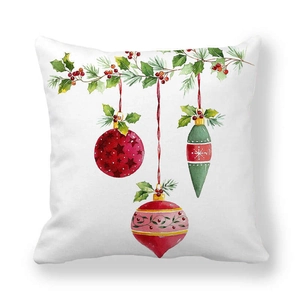 Christmas watercolor cushion cover with festive red and green ornaments on white fabric