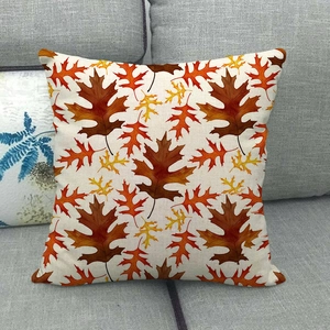 Detailed close-up of maple leaf patterns on linen fall harvest throw pillow cover
