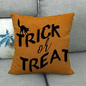 Halloween orange pillow cover featuring a black cat silhouette and Trick or Treat text