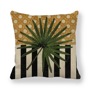Linen pillow cover with green leaf design, brown weave pattern and black stripes
