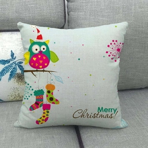 Linen Christmas pillowcase featuring a cartoon owl, stockings, and Merry Christmas text
