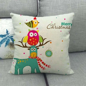 Detail of Christmas owl and reindeer illustration on a linen square throw pillow cover