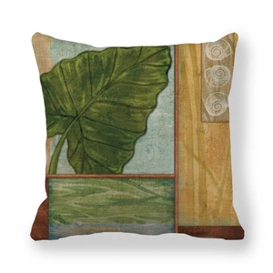 Close-up of vintage green leaf linen pillowcase with thick woven texture and shell patterns