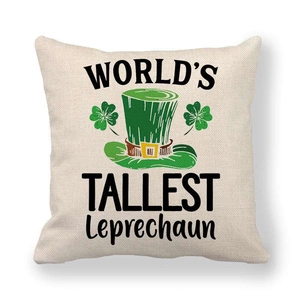 Close-up of linen St. Patrick's Day pillowcase featuring green hat and clover design