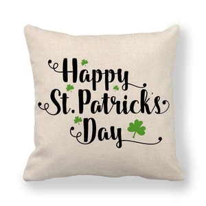 Linen St. Patrick's Day pillowcase featuring green shamrocks and Happy typography