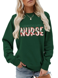 Close-up of labor and delivery nurse lettering with floral pattern on dark green sweatshirt