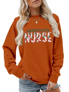 Detail of floral Labor & Delivery Nurse text print on comfortable orange crewneck sweatshirt