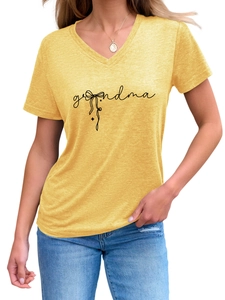 Detailed view of Grandma text and bow print on yellow V-neck short sleeve T-shirt