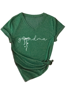 Detail of grandma text with bow on heather dark green V-neck T-shirt with knotted hem
