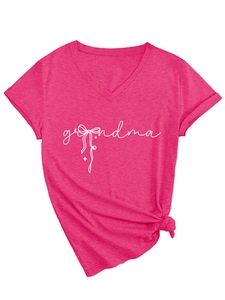 Detail of rose red V-neck T-shirt showing grandma print and side knot hem detail