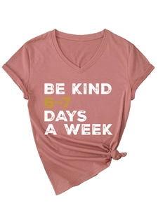 Close-up of Dusty Rose V-neck T-shirt featuring Be Kind 6-7 Days A Week graphic print
