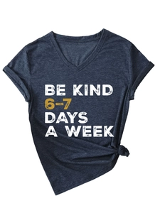 Detail of V-neck dark gray t-shirt featuring Be Kind 6-7 days a week slogan print