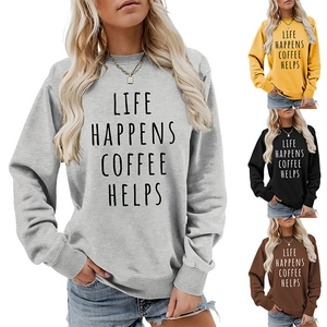 Detail of Life Happens Coffee Helps sweatshirt with ribbed cuffs in multiple colors