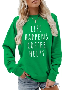 Close-up of Life Happens Coffee Helps white lettering on a green sweatshirt detail