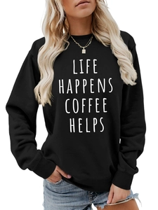 Close-up of LIFE HAPPENS COFFEE HELPS print on black crewneck long sleeve sweatshirt