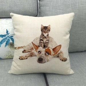 Linen pillow cover featuring a cute cat and dog print on a grey sofa background