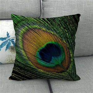 Detail shot of the peacock feather pattern on a linen throw pillowcase for sofa decor