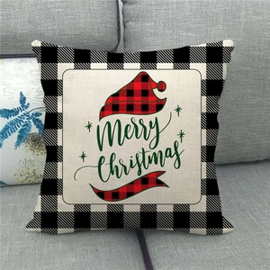 Detail of Christmas pillowcase with buffalo plaid border and Merry Christmas lettering