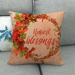 Detailed close-up of linen fabric texture on harvest blessings floral wreath pillow cover