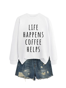 Detail of white cotton sweatshirt with Life Happens Coffee Helps text and denim shorts