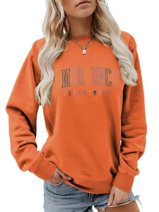 Detail of orange crewneck sweatshirt featuring colorful Emergency Department lettering