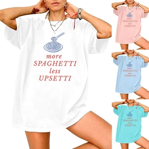 Detailed view of women's oversized graphic tee showing four color options and typography