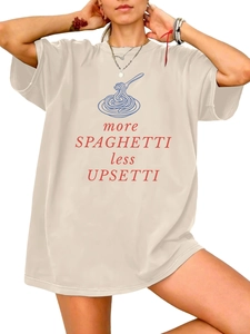 Detail of loose-fit beige cotton t-shirt featuring a spaghetti and fork graphic print