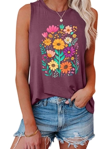 Close-up of a purple sleeveless floral tank top paired with denim shorts for summer